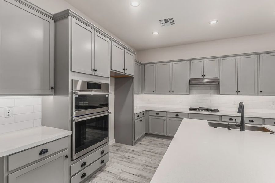 Furnished interior view inside a new home in Valencia at Granite Vista, Waddell (Image 7).