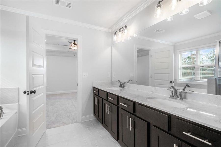 Furnished interior view inside a new home in Calgary Downs, Winder (Image 16).