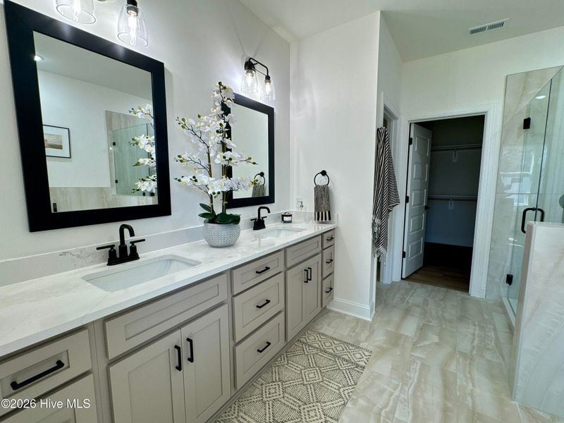 Furnished interior view inside a new home in Dixon Grove, Grimesland (Image 12).