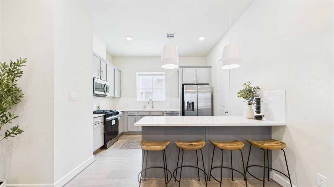 Furnished interior view inside a new home in White Oak Station, Houston (Image 8). Furnished interior view inside a new home in White Oak Station, Houston (Image 8).