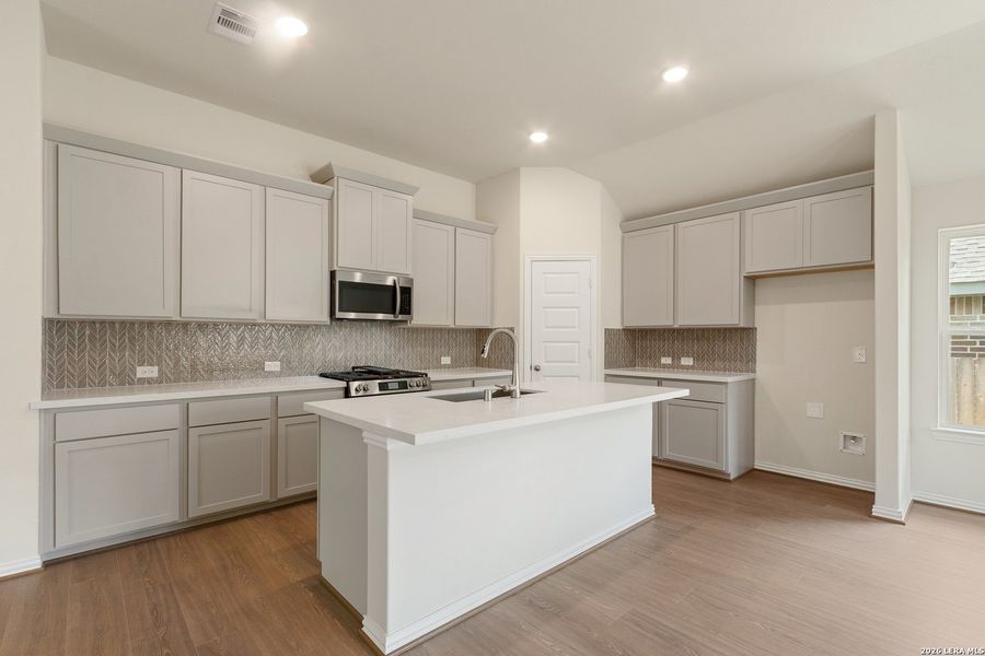 Furnished interior view inside a new home in Prominence, San Antonio (Image 8).