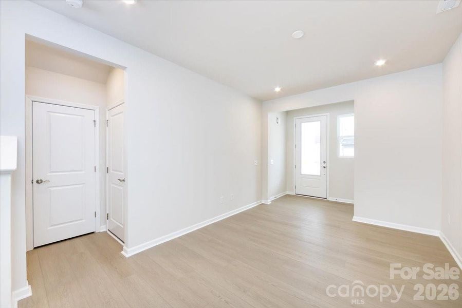 Living Area with coat closet and Garage Entrance Living Area with coat closet and Garage Entrance