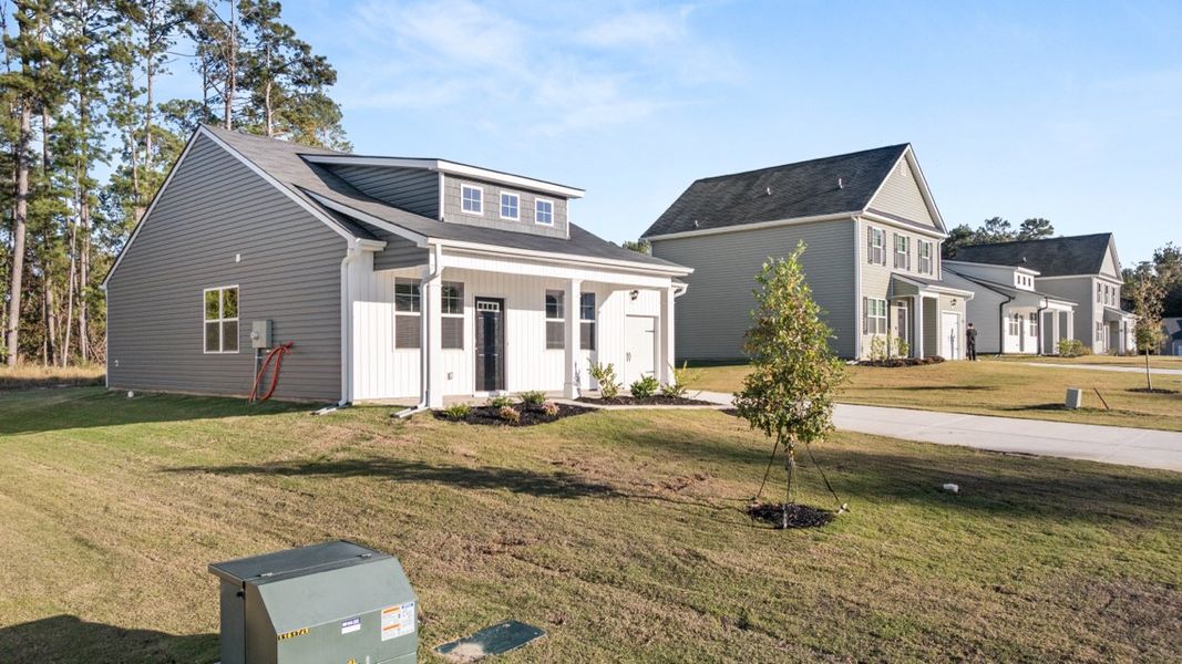 Front exterior of a new home in Bellemeade Landing, Augusta, GA, highlighting curb appeal (Image 17). Front exterior of a new home in Bellemeade Landing, Augusta, GA, highlighting curb appeal (Image 17).
