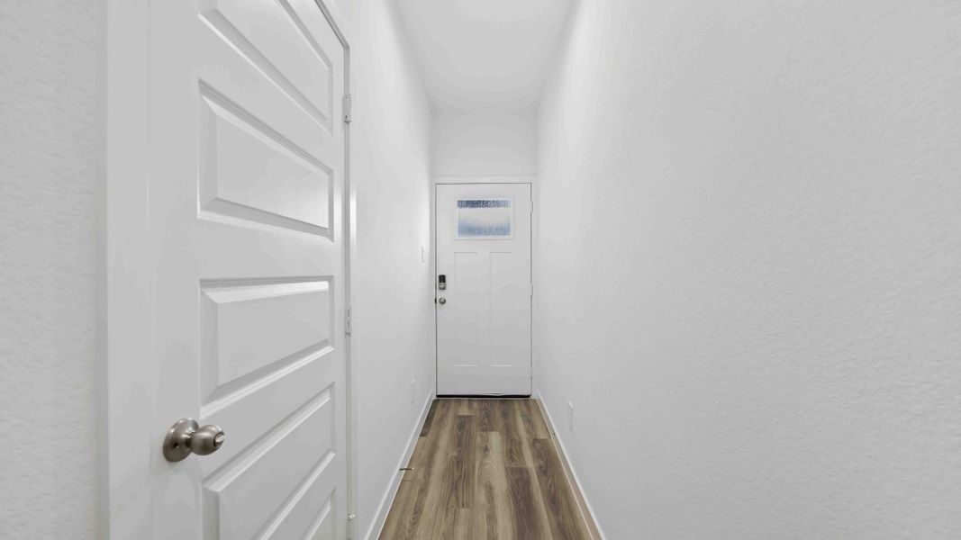 Representative unfurnished interior of a home built from the Magnolia by D.R. Horton in Grand West, Houston (Image 14).