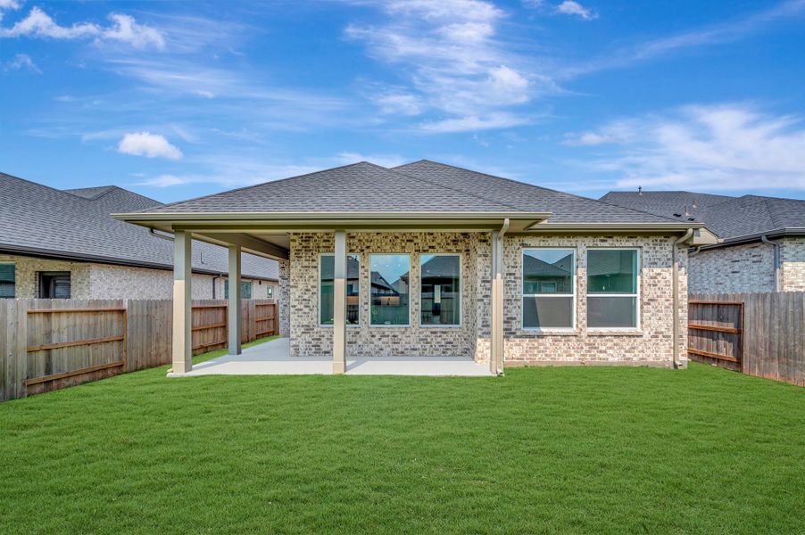 Exterior details and patio area of a home in Brookewater - Terrace Collection, Rosenberg (Image 3).