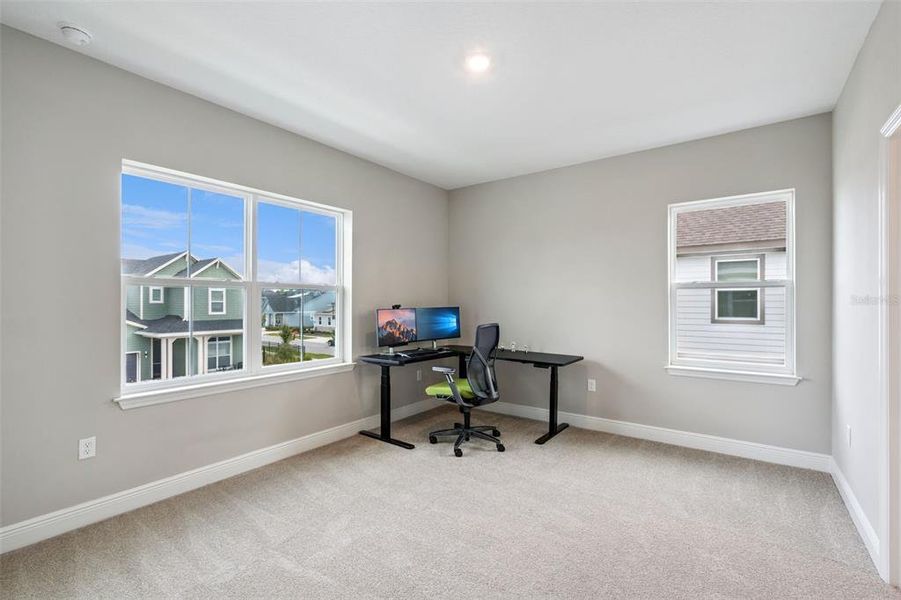 Furnished interior view inside a new home in Weslyn Park at Sunbridge, St. Cloud (Image 21).