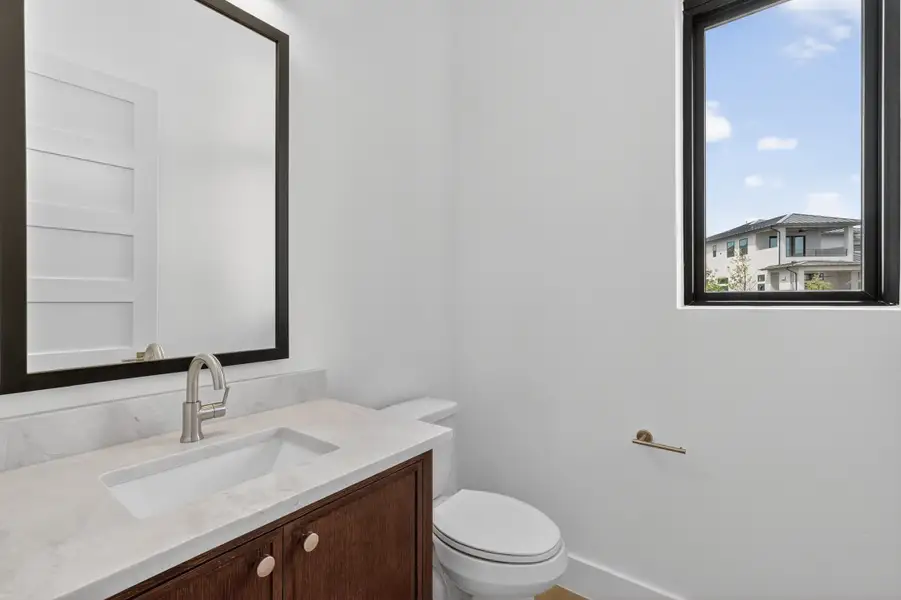 Furnished interior view inside a new home in Milky Way at River Place, Austin (Image 4).