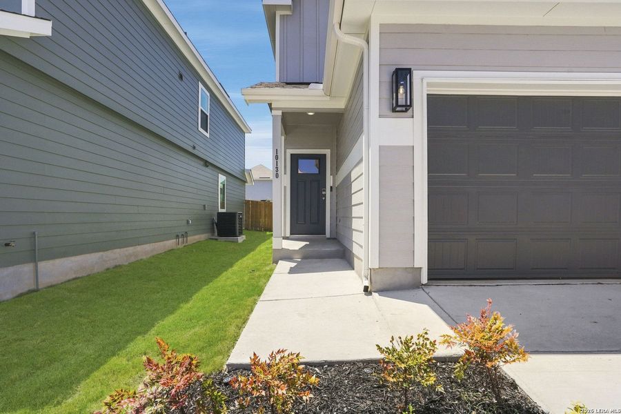 Exterior details and patio area of a home in Melissa Ranch, San Antonio (Image 17).