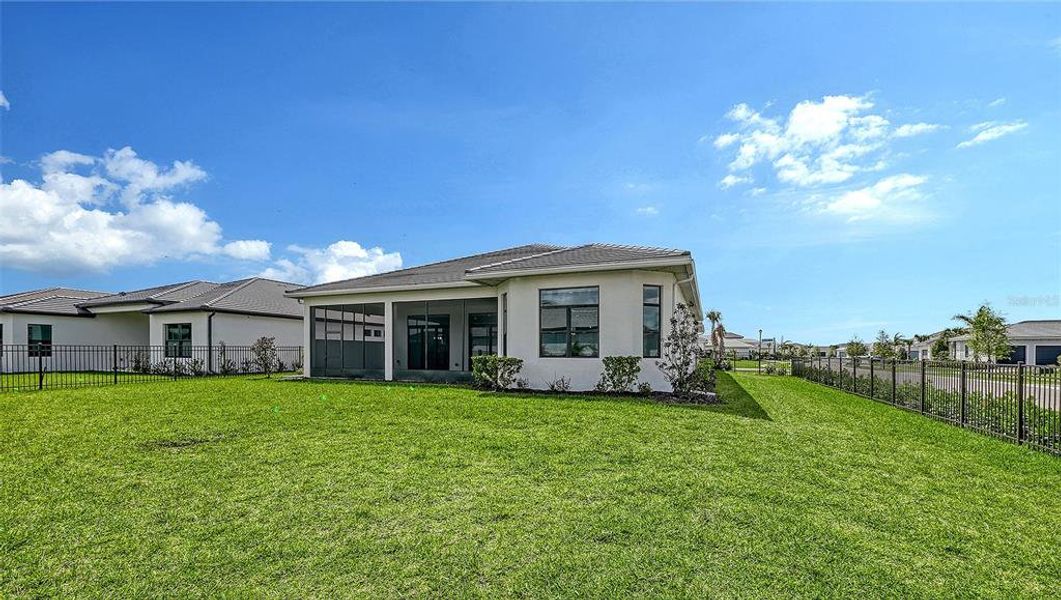 Exterior details and patio area of a home in Artistry Sarasota, Sarasota (Image 27).