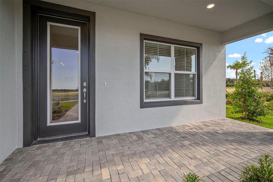 Exterior details and patio area of a home in North River Ranch, Parrish (Image 3).