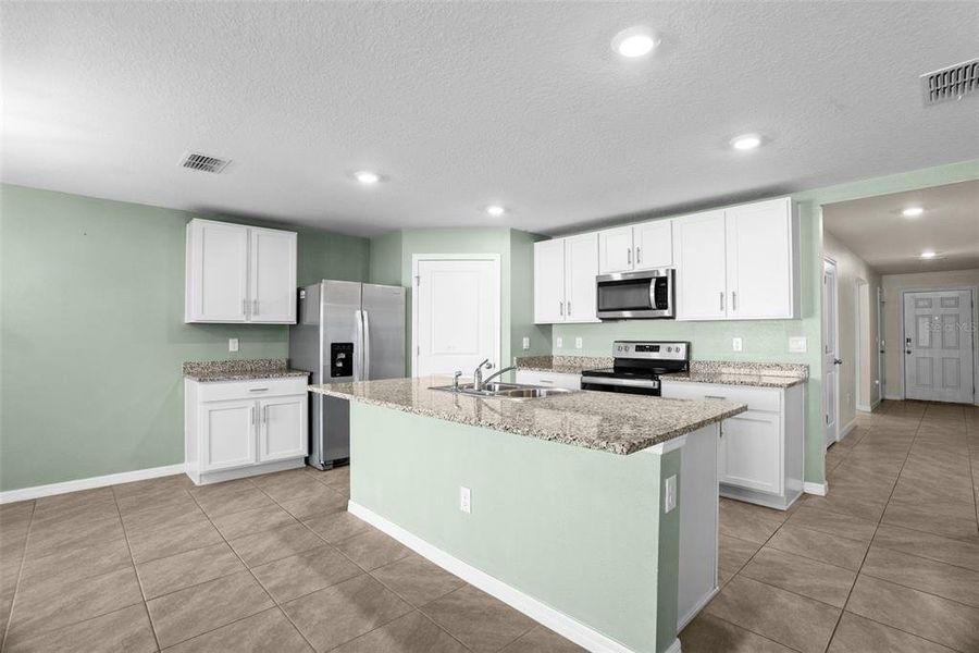 Furnished interior view inside a new home in Pine Creek, Spring Hill (Image 6).