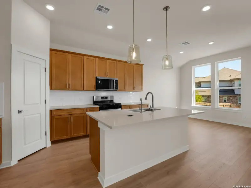 Furnished interior view inside a new home in Comanche Ridge, San Antonio (Image 11).
