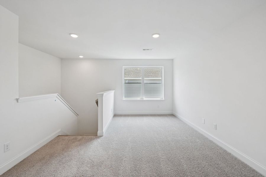 Representative unfurnished interior of a home built from the Macon by Ashton Woods in Ascent at Arbor Ridge, La Vergne (Image 9).