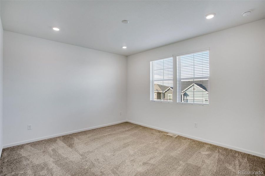Spacious, unfurnished interior of a new home in Westside Crossing Townhomes, Berthoud (Image 34).