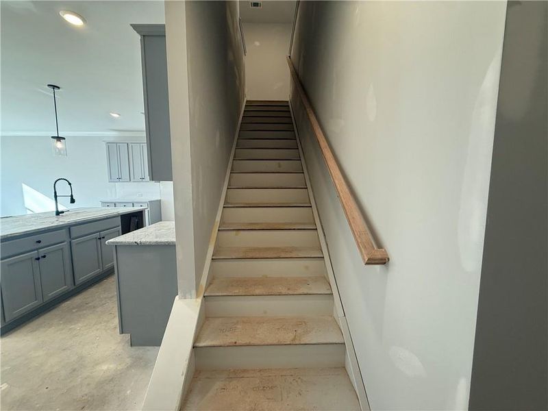 In-progress construction of a new home in The Towns at Auburn Station East, Auburn, GA (Image 17).