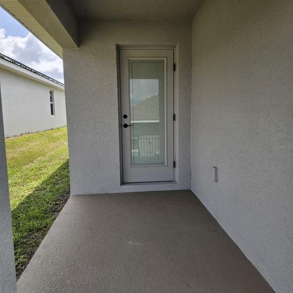Exterior details and patio area of a home in Magnolia Park, Haines City (Image 25).