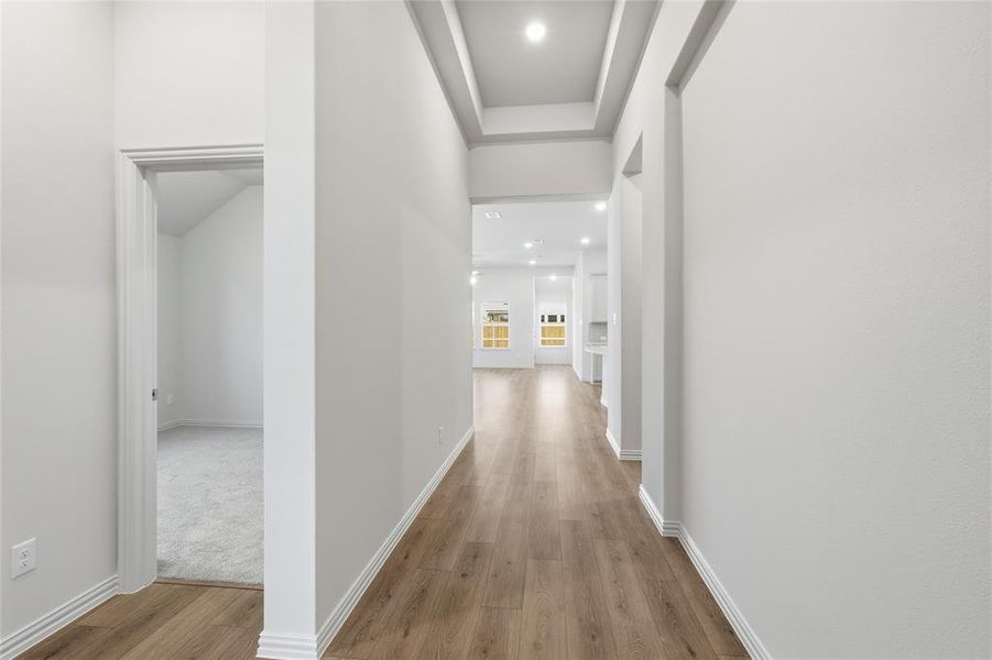 Hall featuring recessed lighting and light wood finished floors