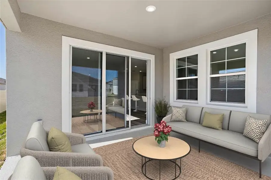 Exterior details and patio area of a home in Pasadena Woods, Wesley Chapel (Image 2).