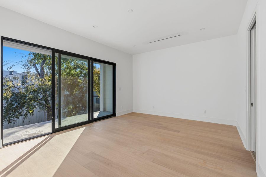 Quaker Aluminum sliding doors to sizable balcony in Primary Suite.
