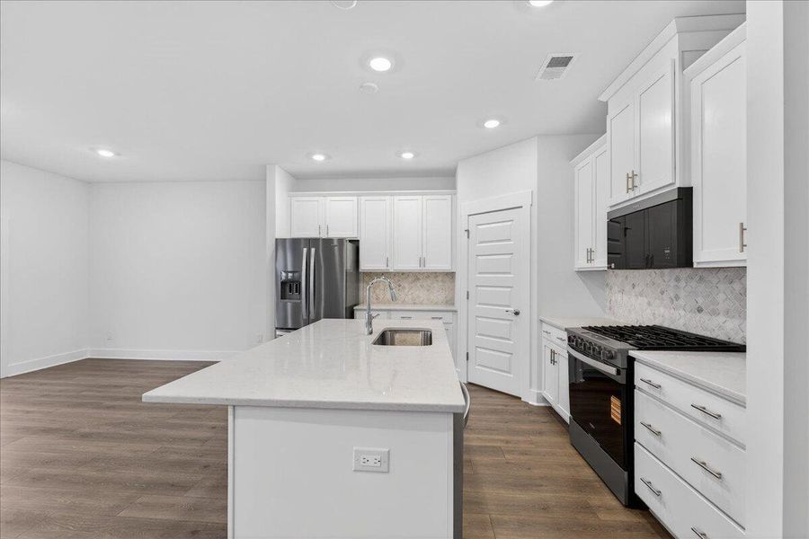 Furnished interior view inside a new home in The Coves at Lakes of Cane Bay, Summerville (Image 12).