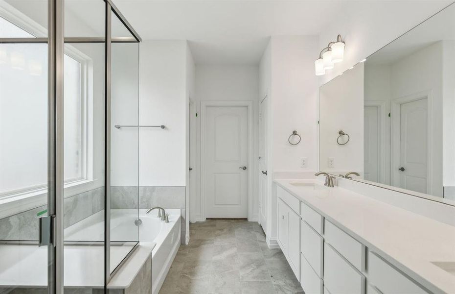 Oversized owner's bath with oversized shower*real home pictured