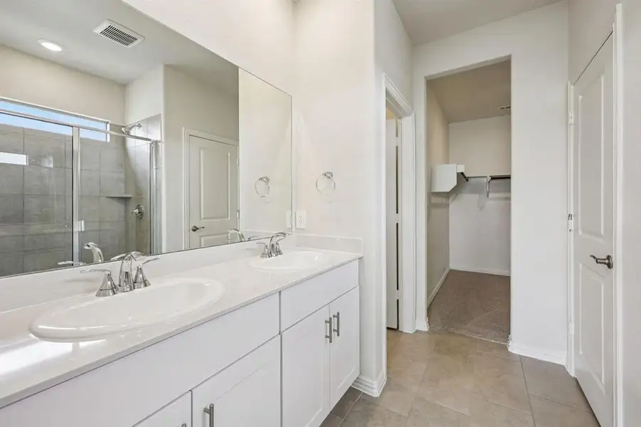 Furnished interior view inside a new home in Lakehaven - Spring Series, Farmersville (Image 7).