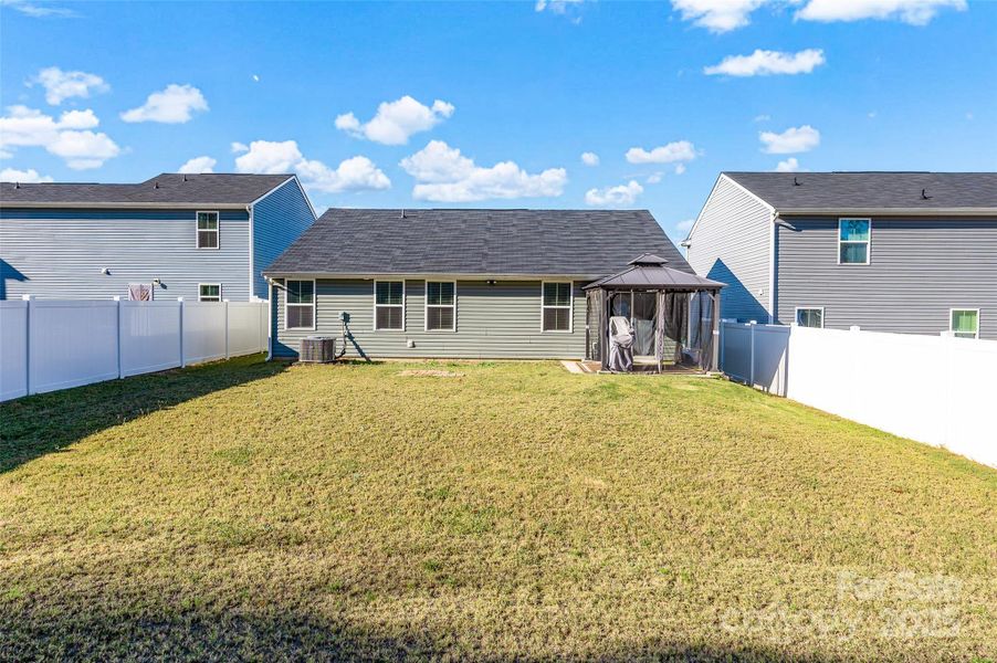 Exterior details and patio area of a home in , Troutman (Image 4).