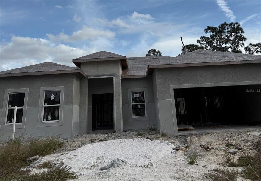 In-progress construction of a new home in , North Port, FL (Image 18).