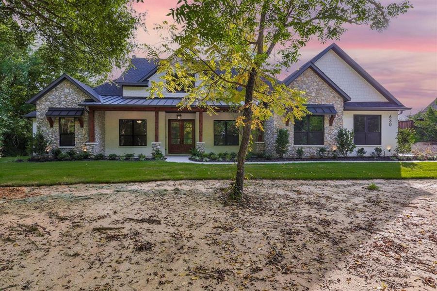 Front exterior of a new home in , Waxahachie, TX, highlighting curb appeal (Image 1).