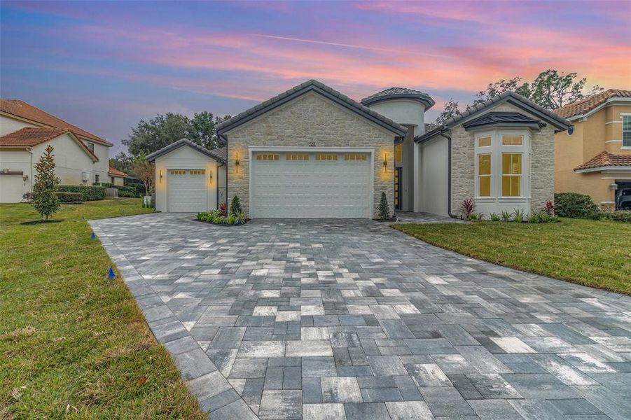 Front exterior of a new home in , Lake Mary, FL, highlighting curb appeal (Image 1). Front exterior of a new home in , Lake Mary, FL, highlighting curb appeal (Image 1).
