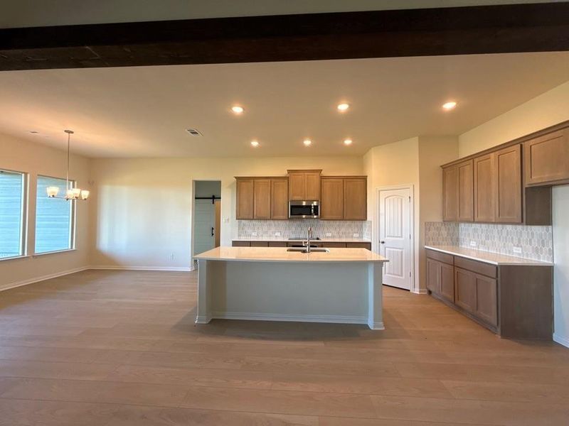 Furnished interior view inside a new home in Clear Sky Addition, Valley View (Image 5).