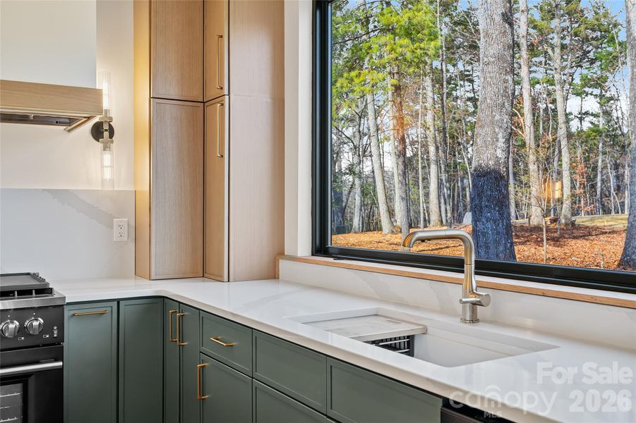 Quartz countertops with full-height backsplash