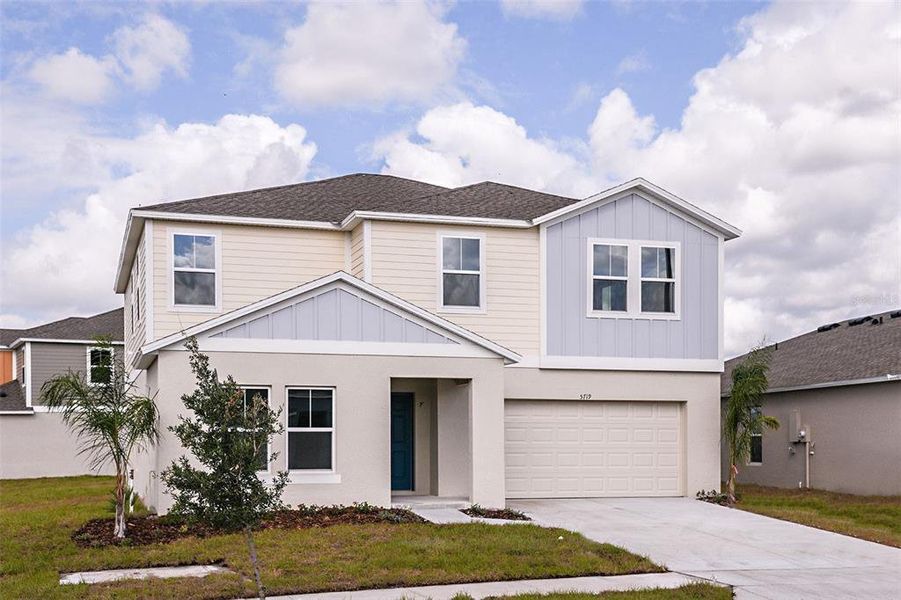 Front exterior of a new home in Villa Mar, Winter Haven, FL, highlighting curb appeal (Image 1). Front exterior of a new home in Villa Mar, Winter Haven, FL, highlighting curb appeal (Image 1).