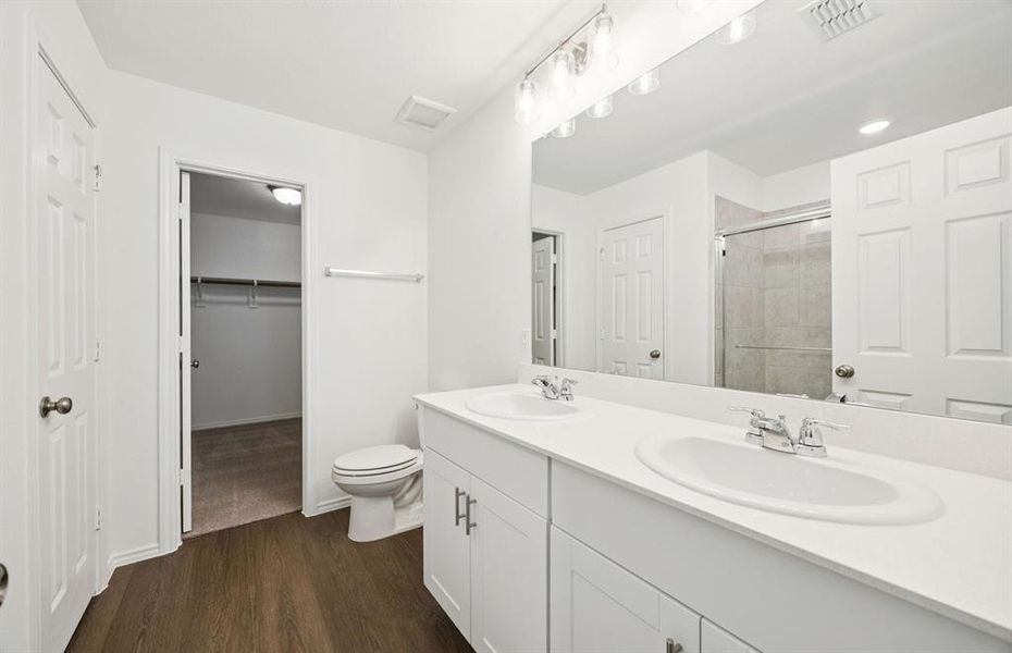 Owner's private bath with double sinks Owner's private bath with double sinks