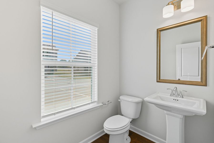 Representative furnished interior of a home built from the Palmetto II by McGuinn Homes in Clarke Townes, Anderson (Image 11).