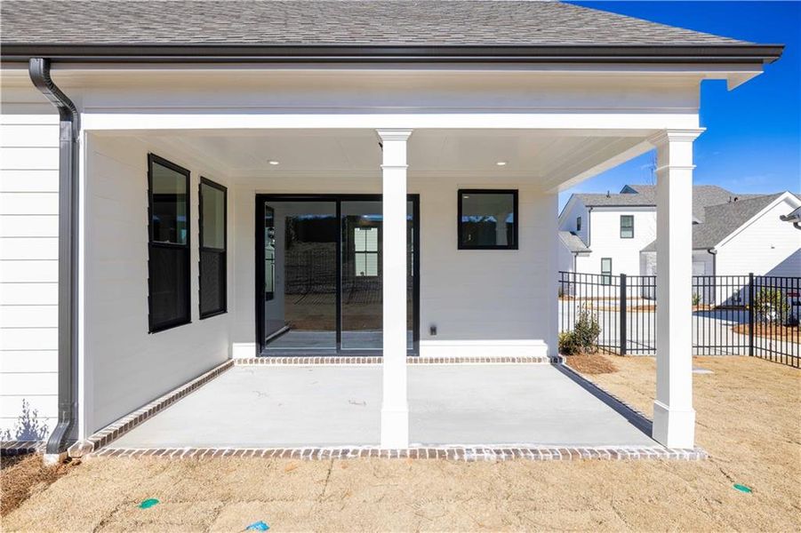Exterior details and patio area of a home in Promenade at Sawnee Village, Cumming (Image 3). Exterior details and patio area of a home in Promenade at Sawnee Village, Cumming (Image 3).