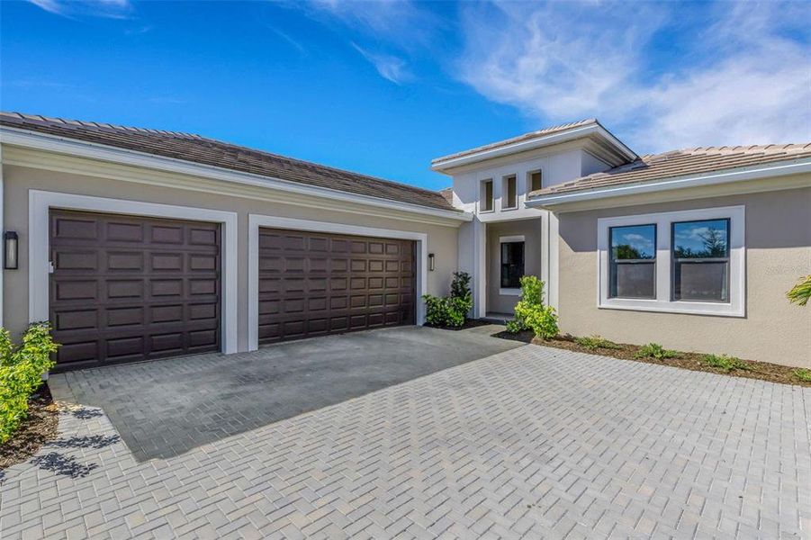 Exterior details and patio area of a home in Artistry Sarasota, Sarasota (Image 3).