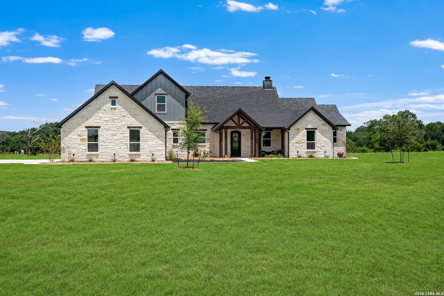 Front exterior of a new home in , Iola, TX, highlighting curb appeal (Image 2). Front exterior of a new home in , Iola, TX, highlighting curb appeal (Image 2).