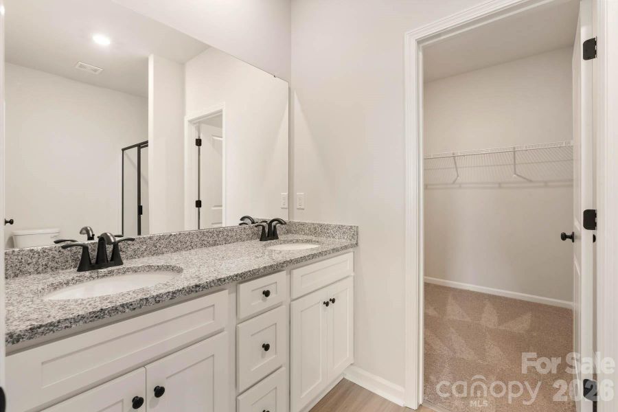 Furnished interior view inside a new home in Stagecoach Station, Gastonia (Image 4).