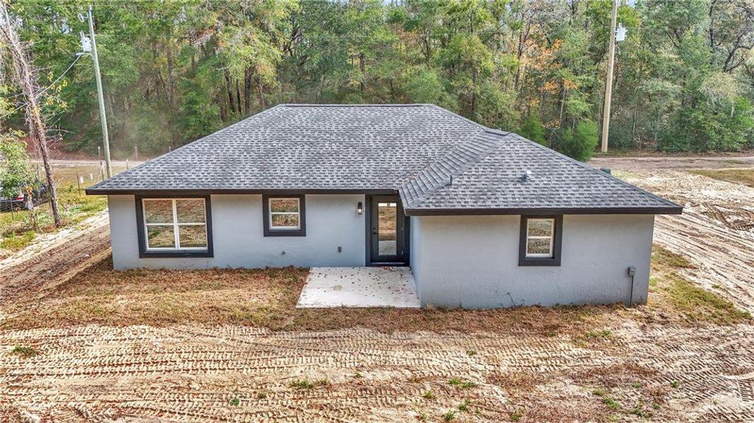 Front exterior of a new home in , Ocala, FL, highlighting curb appeal (Image 2).