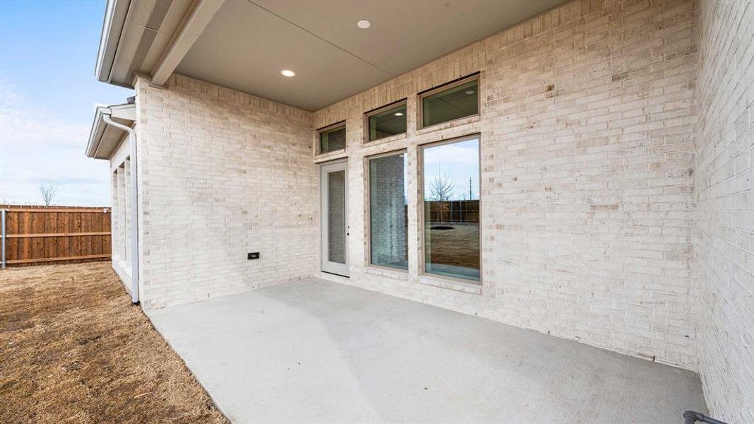 Exterior details and patio area of a home in Trinity Falls, McKinney (Image 3).