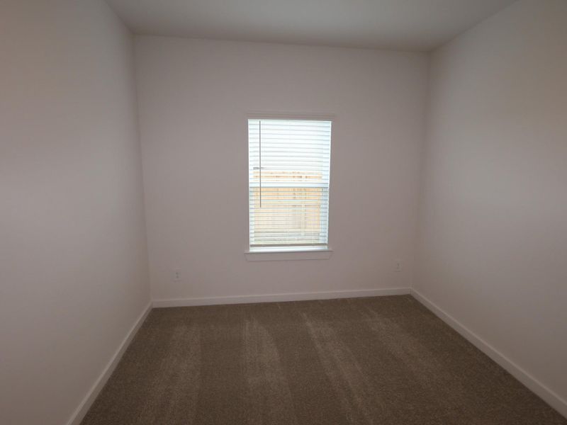 Spacious, unfurnished interior of a new home in Pinewood at Grand Texas, New Caney (Image 27).