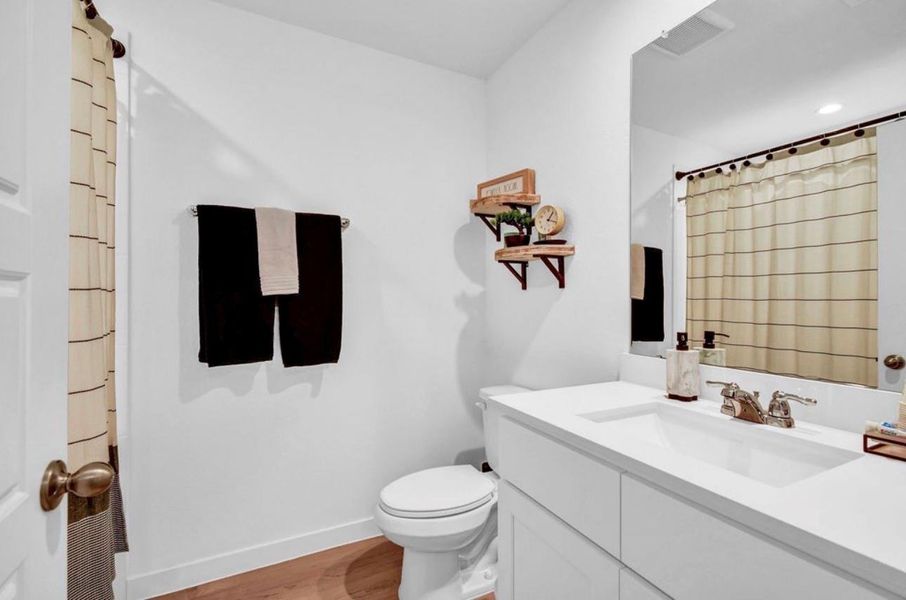 Furnished interior view inside a new home in Riverwood Ranch, Angleton (Image 14).