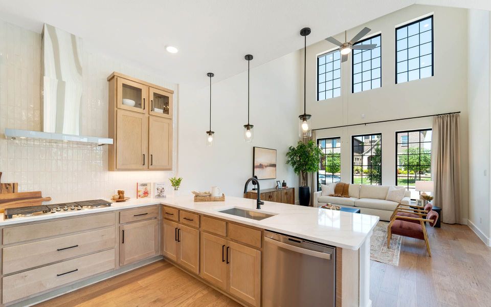 Representative furnished interior of a home built from the Rainier by CastleRock Communities in The Summit at Center Stage, Keller (Image 10).