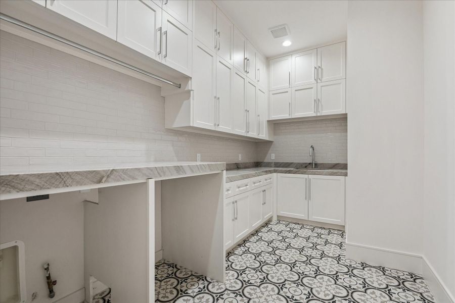 Furnished interior view inside a new home in , West University Place (Image 28).