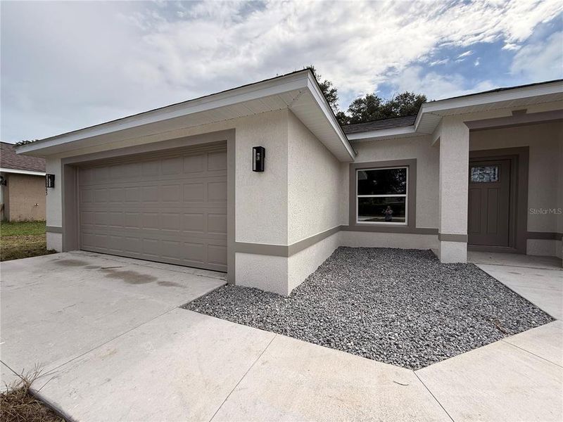 Exterior details and patio area of a home in , Summerfield (Image 13).