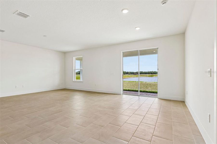 Spacious, unfurnished interior of a new home in Lakeside at Satilla, St. Cloud (Image 27).