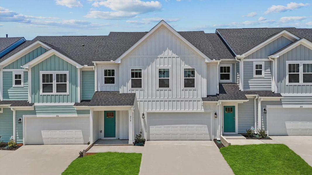Front exterior of a new home in Village at Midway, Anderson, SC, highlighting curb appeal (Image 2).