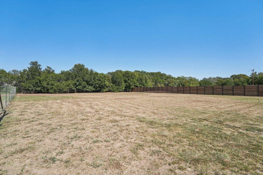 A rare combination of acreage, privacy, and scenic beauty—this outdoor haven embodies the best of Hill Country living.