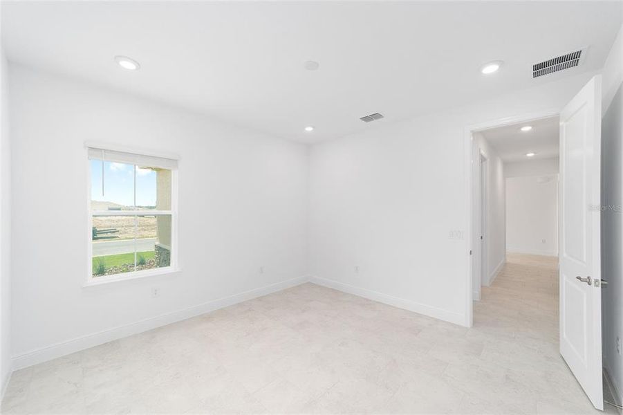 Spacious, unfurnished interior of a new home in On Top of the World Communities, Ocala (Image 50).